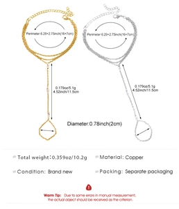 Detail showing measurements and specifications for gold and silver layered hand chains.