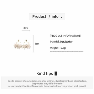 Detail view of leather flower earrings with material and weight specifications