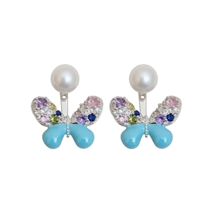 Exquisite butterfly earrings with colorful zircons, pearls, and light blue enamel finish.