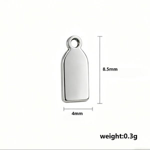Macro detail view of 8.5mm x 4mm stainless steel tag pendant for DIY jewelry making
