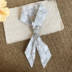 Elegant French silk scarf necklace with grey rose print and silver butterfly buckle