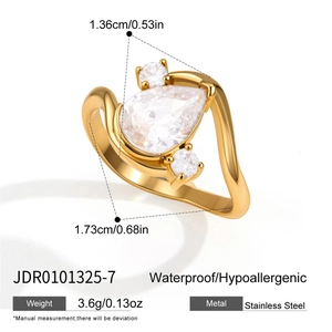 Detailed view of pear-shaped zircon ring in gold-plated stainless steel with size specs