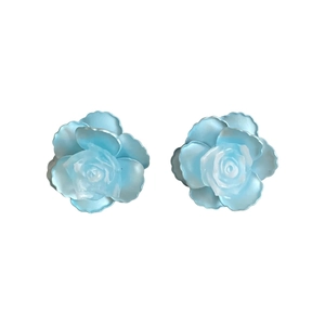 Elegant light blue camellia flower stud earrings with a pearlescent finish