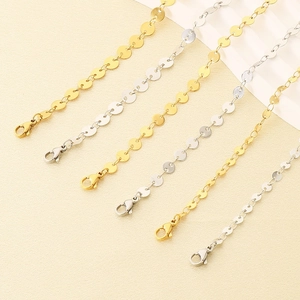 Minimalist stainless steel flat disc anklets for women in gold and silver finishes