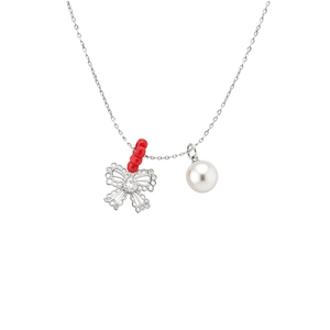 Elegant silver necklace featuring a zircon hollow bow and white pearl pendant for women