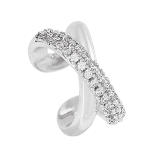 Detailed macro view of a silver X-shaped ear cuff with sparkling cubic zirconia