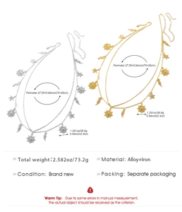 Spécifications détaillées de la chaîne de taille à breloques célestes en or et argent.