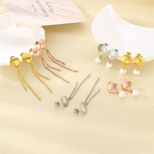 Collection of shell tassel and pearl earrings in gold, silver, and rose gold finishes.