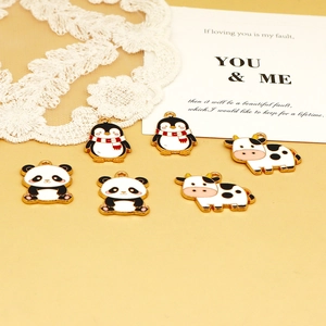 Detailed view of cute cartoon penguin panda and cow alloy enamel charms for DIY jewelry making