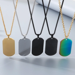 Five stainless steel dog tag necklaces in gold, silver, black, and rainbow finishes.