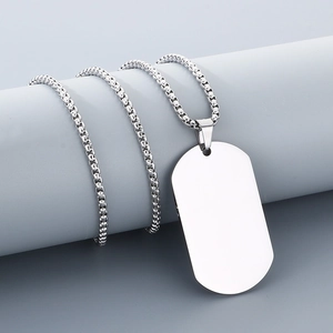 Detail view of silver stainless steel dog tag necklace with box chain for engraving