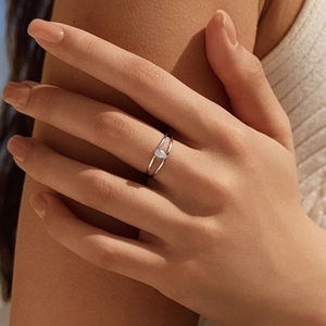 Minimalist S925 sterling silver double-layer ring featuring a pear-cut moissanite stone