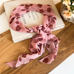 Vintage floral print pink chiffon scarf tied as elegant neck accessory