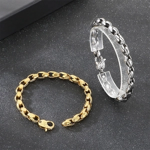 Close-up detail of retro stainless steel corn chain bracelet with spindle shaped links.