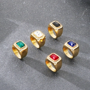 Variety of men's gold hip-hop rings featuring vibrant rectangular colorful gemstones