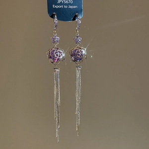 Elegant 18k gold plated drop earrings featuring purple rose crystals and long chain tassels