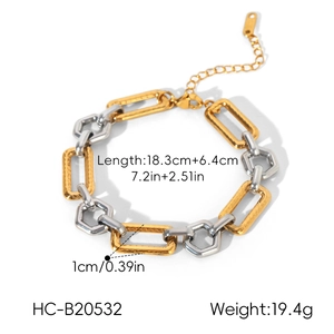 Detailed view of two-tone stainless steel geometric link bracelet with measurements