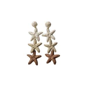 Handmade raffia starfish dangle earrings featuring a stylish tri-color gradient summer design.