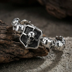 Gothic punk style titanium steel men's bangle featuring 3D skull and cross design