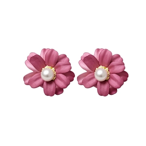 Elegant mauve fabric flower stud earrings with white pearl centers and silver pins