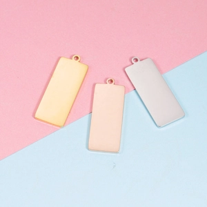 Polished stainless steel rectangular pendants in gold, silver, and rose gold finishes