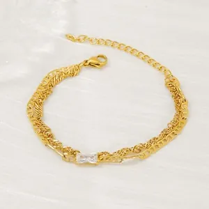 Detail view of double-layer gold chain bracelet with rectangle zircon and lobster clasp