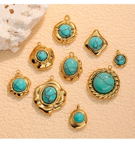 Detailed set of eight gold-plated stainless steel pendants with turquoise stone insets