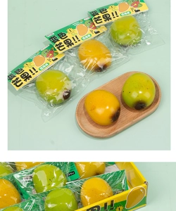 Detail of color-changing mango squishy toy in retail packaging with realistic fruit texture