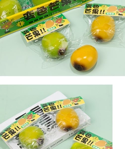 Macro shot of mango squeeze toys in green and yellow colors with clear bag packaging