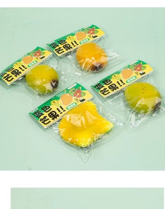Detail of color-changing mango squishy toy in individual retail packaging for stress relief