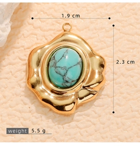 Macro view of gold plated wavy turquoise pendant with dimensions 1.9cm and 2.3cm