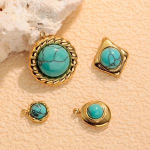 Gold plated stainless steel geometric turquoise pendant set with four unique jewelry shapes