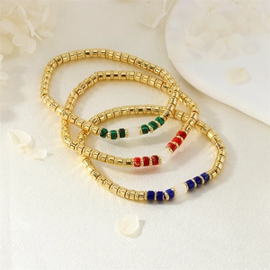 Bohemian armbandenset met veelkleurige halfedelstenen en gouden kralen