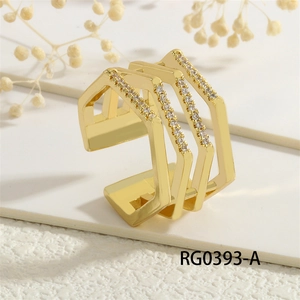 Macro detail of 18K gold plated multi-layer geometric ring with white zircon stones