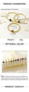 Detailed view of 6mm gold-plated copper beads and Halloween charms like skulls and pumpkins