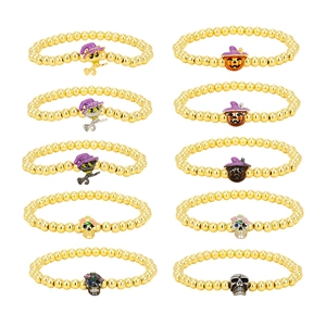 10-piece Halloween beaded bracelet set with gold beads, skull, pumpkin, and witch cat charms