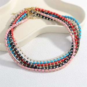 Handmade semi-precious stone bead necklace with gold spacers in five vibrant colors
