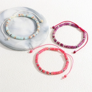 Handmade semi-precious stone barrel bead braided bracelets in blue, purple and pink