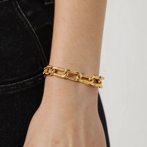 Industrial retro style gold chain bracelet with textured oval links for street fashion