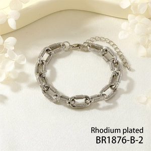 Detail of rhodium plated heavy metal chain bracelet with textured links and lobster clasp
