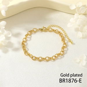 Detailed macro of gold plated heavy metal chain bracelet with lobster clasp and adjuster