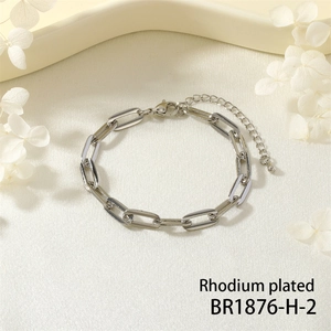 Close-up of rhodium plated heavy industrial style silver chain bracelet with lobster clasp