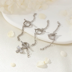 Sparkling zircon bee heart OT toggle clasps for jewelry making displayed on a ceramic tray