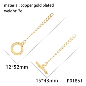 Detailed view of gold plated copper OT toggle clasp with textured hammered finish
