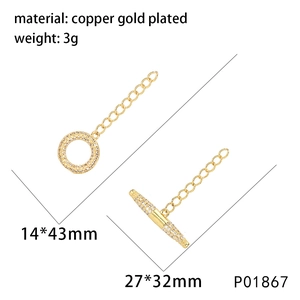 Detailed macro of a gold-plated OT toggle clasp with micro-pave zircon heart and bee