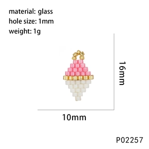 Macro detail of handmade ice cream bead pendant with dimensions and 1mm hole size