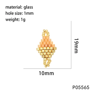 Macro view of geometric woven bead pendant in pink and gold showing dimensions 19x10mm