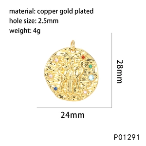 Macro view of Gemini tarot pendant with embossed figures and multi-color zircon stones