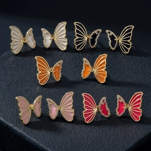 Elegant butterfly earrings in five colors with sparkling crystals and gold plating