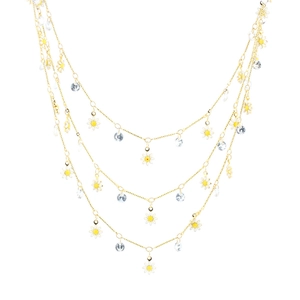 Three-layer gold necklace with daisy pendants and sparkling cubic zirconia crystals